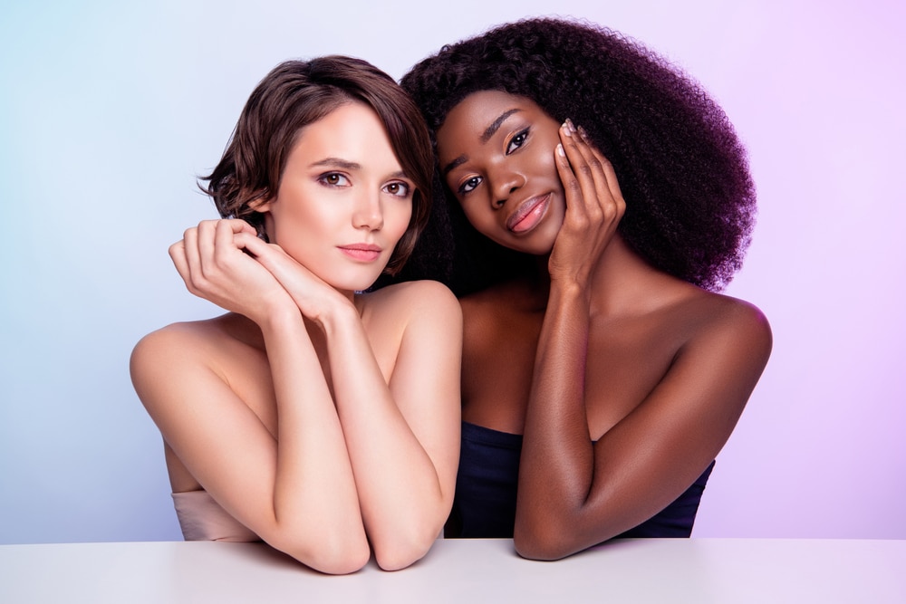 Two women with radiant skin, showcasing beauty treatments.